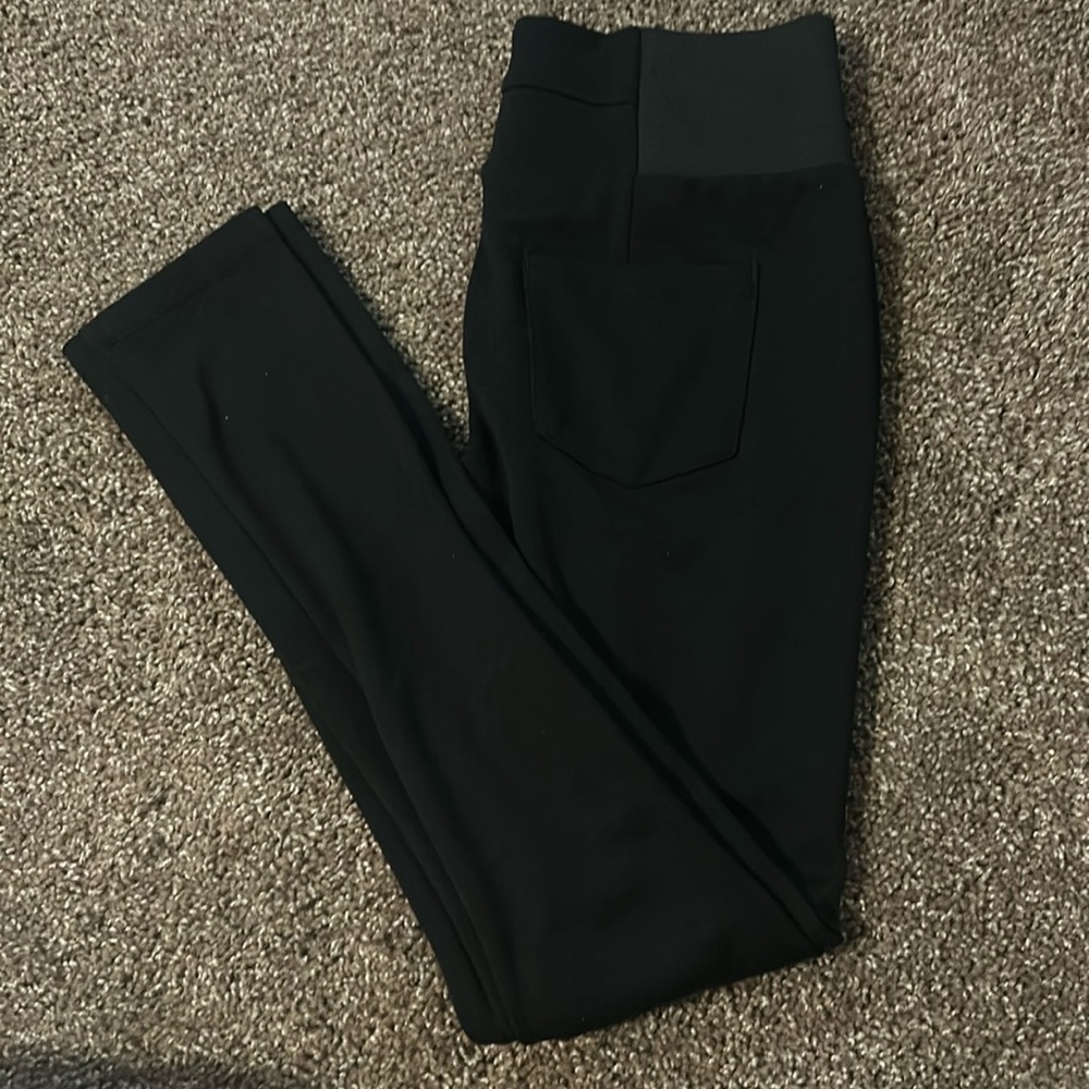 Woman’s Black jegging size large have back pockets